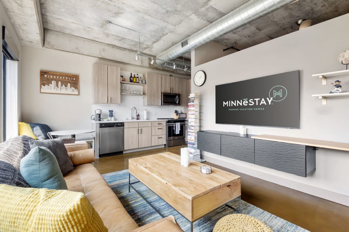 Your stylish loft combines industrial charm with modern comfort. Exposed concrete ceilings and sleek finishes create the perfect urban retreat.
